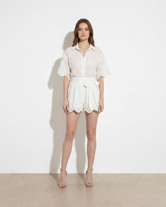 Anaïs Eyelet Lace Button-Up Romper — studio model shot