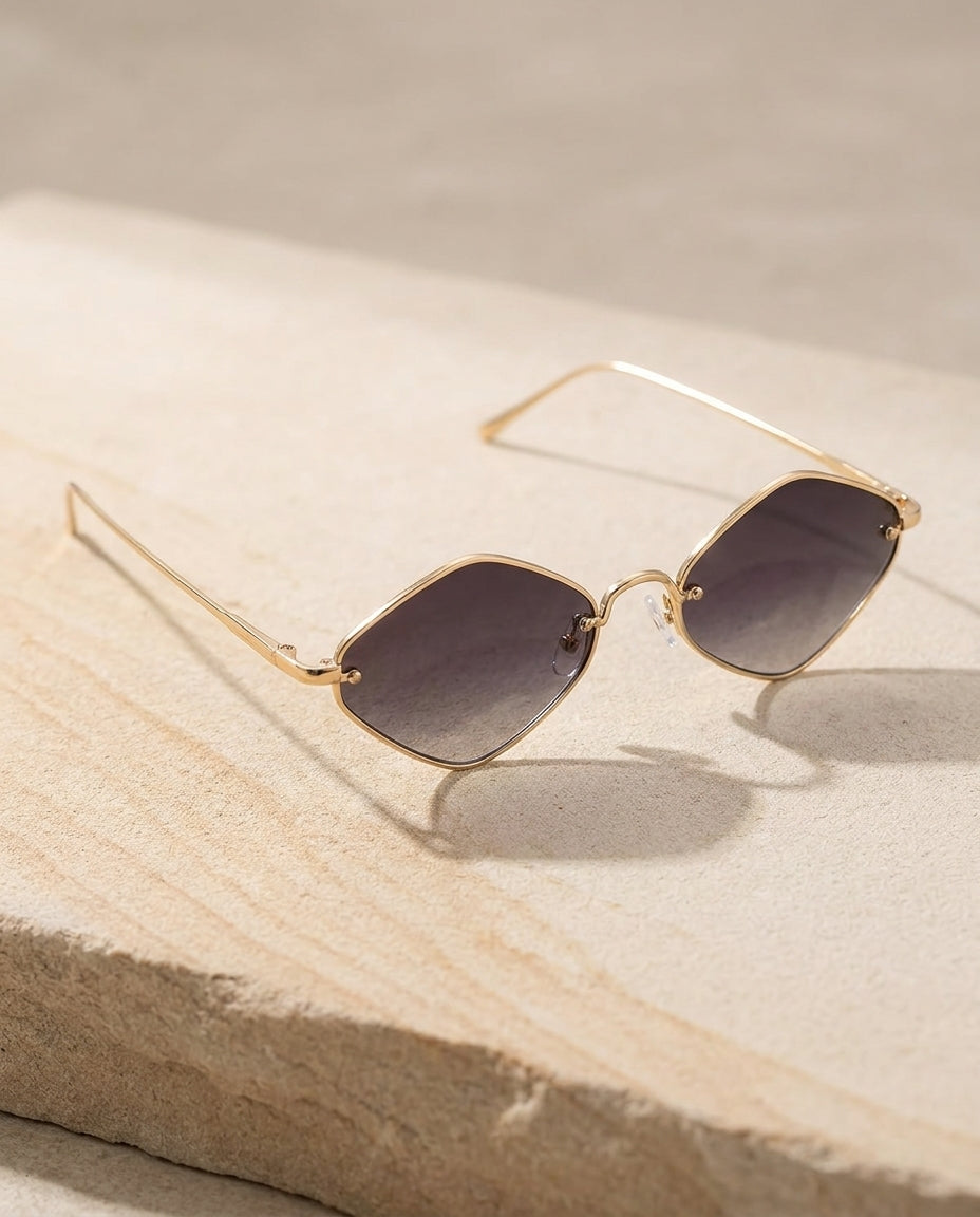 Chrysanthe — cat-eye gold frame sunglasses product shot