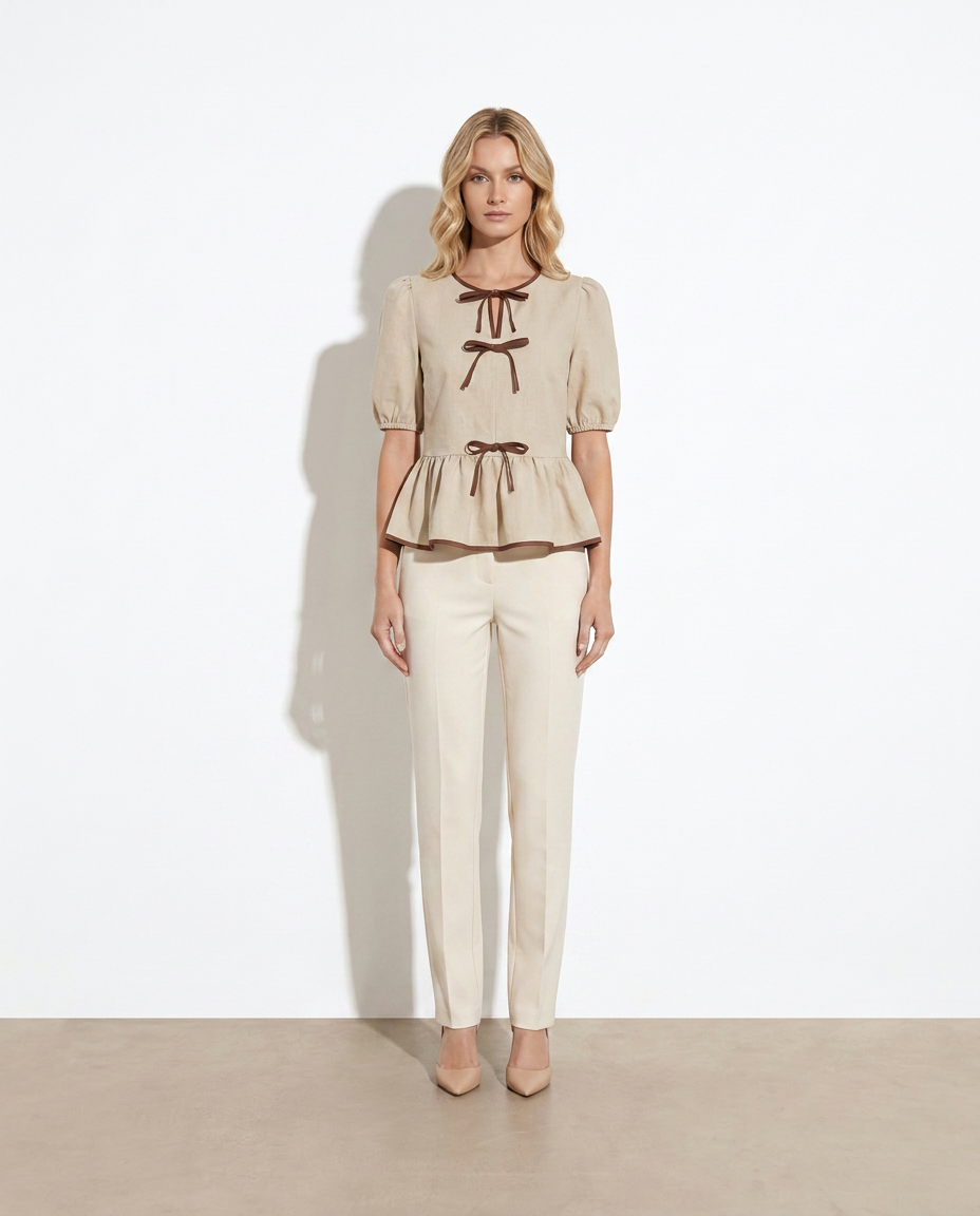 Colette Bow-Front Ruffle Blouse — studio model shot