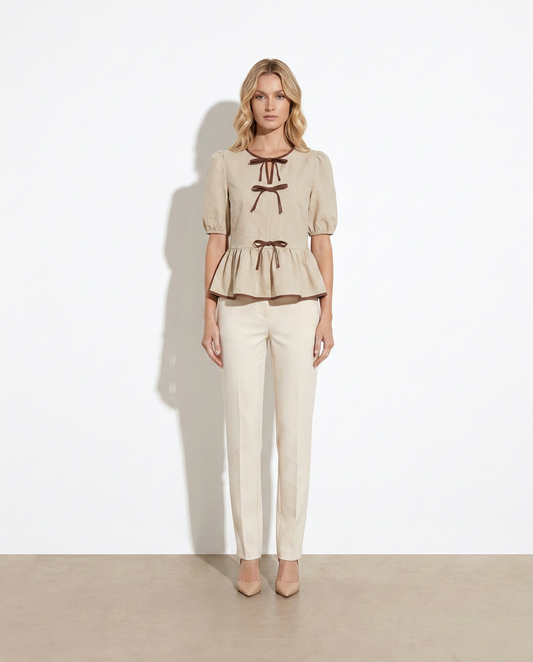 Colette Bow-Front Ruffle Blouse — studio model shot