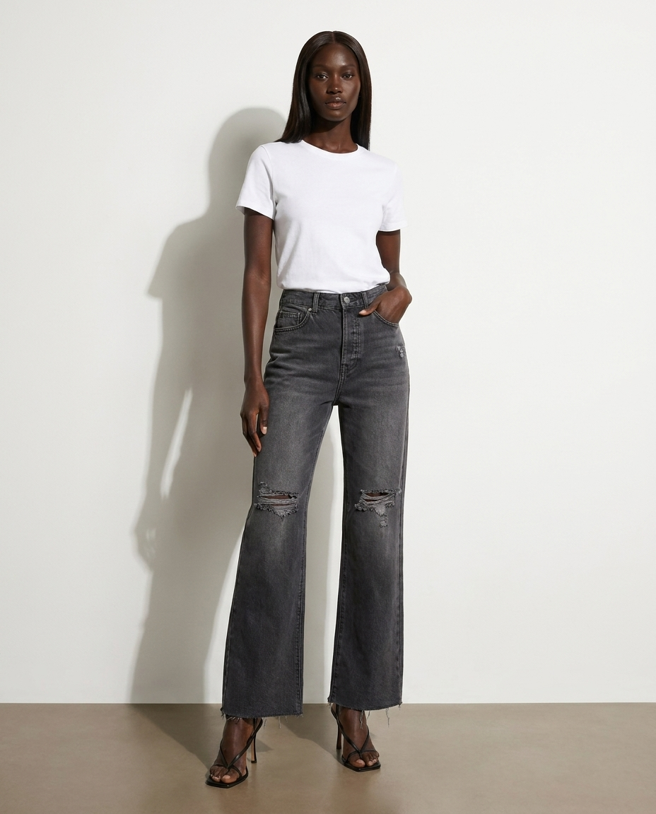 Eldrid Distressed Buttoned Loose Fit Jeans — studio model shot