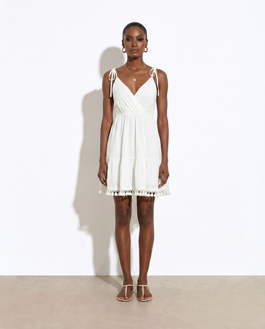 Slavena Surplice Summer Mini Dress with Tassel Hem — studio model shot